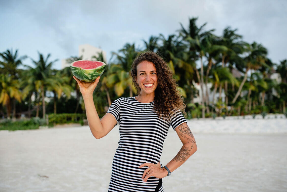 Carly holding a watermelon